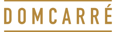 domcarre-koeln-logo Logo des DomCarré mit goldener Schrift, eingerahmt von Linien oben und unten.