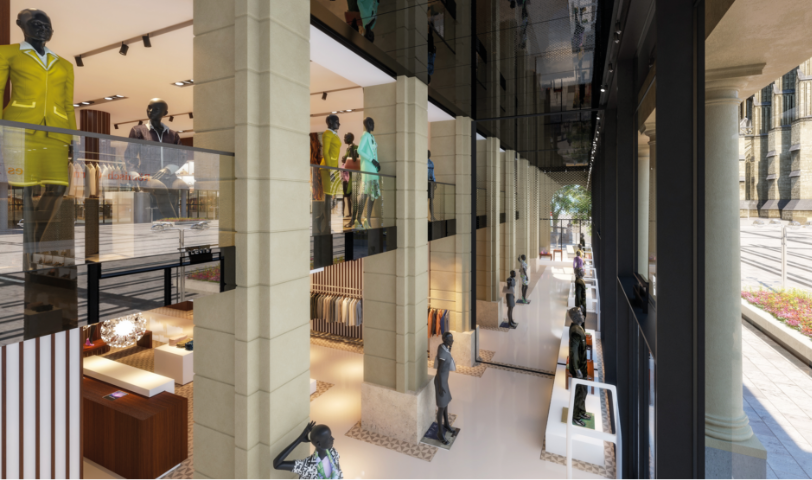 domcarre-koeln-retail-modegeschaeft-design Innenansicht eines Modegeschäfts mit Glaswänden und modernen Designelementen.